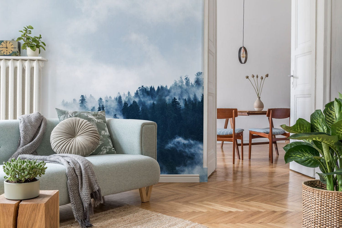 Misty Forest Mural Wallpaper in lounge, featuring grey sofa, wooden flooring, and dining set.