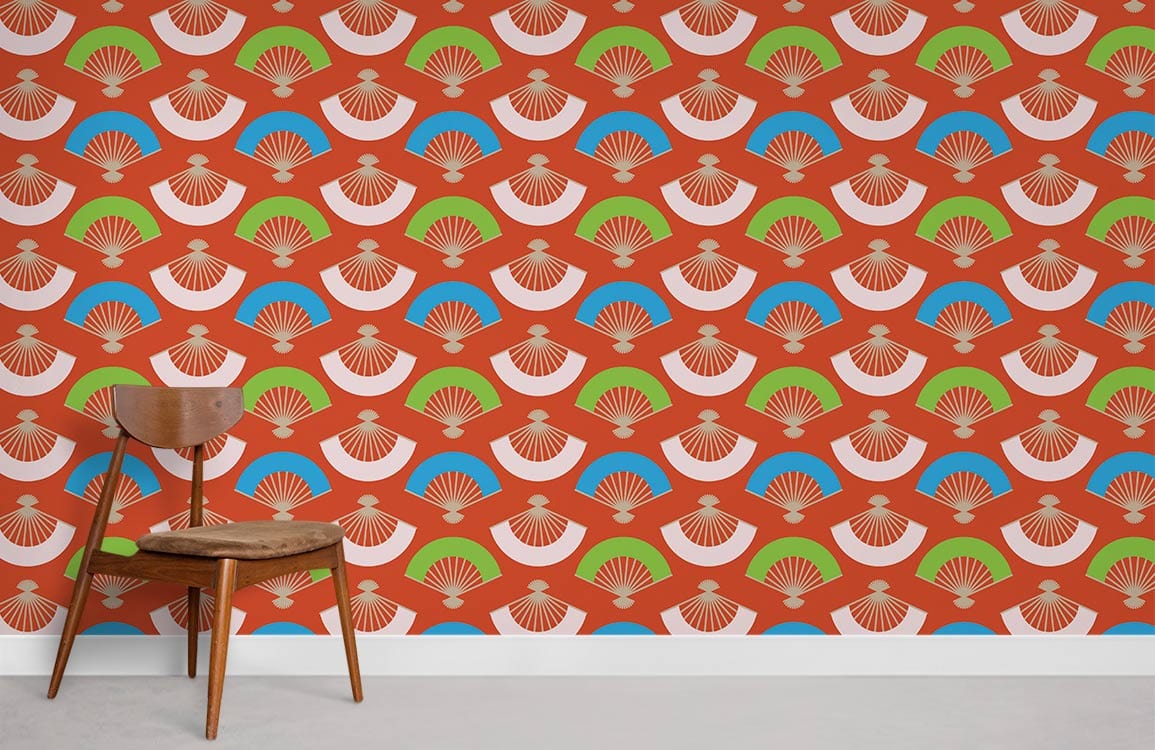 Vibrant Retro Fan Pattern Wallpaper in red, green, blue with wooden chair on grey flooring.