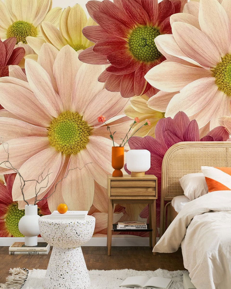 Charming retro floral mural wallpaper with pastel hues, rattan bed frame, beige bedding, modern side table.