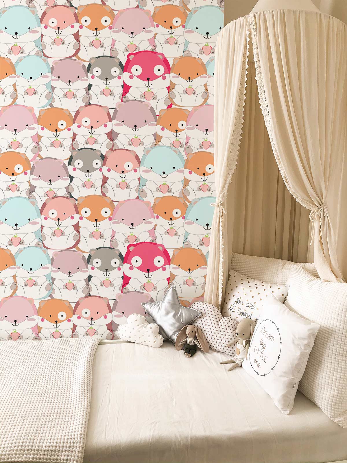 Charming pastel hamster wallpaper in children's room with canopy bed and soft bedding in cream tones.