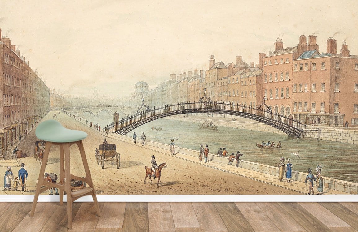Vintage cityscape mural wallpaper with historic bridge, light wood flooring, and vintage-style stool in room.