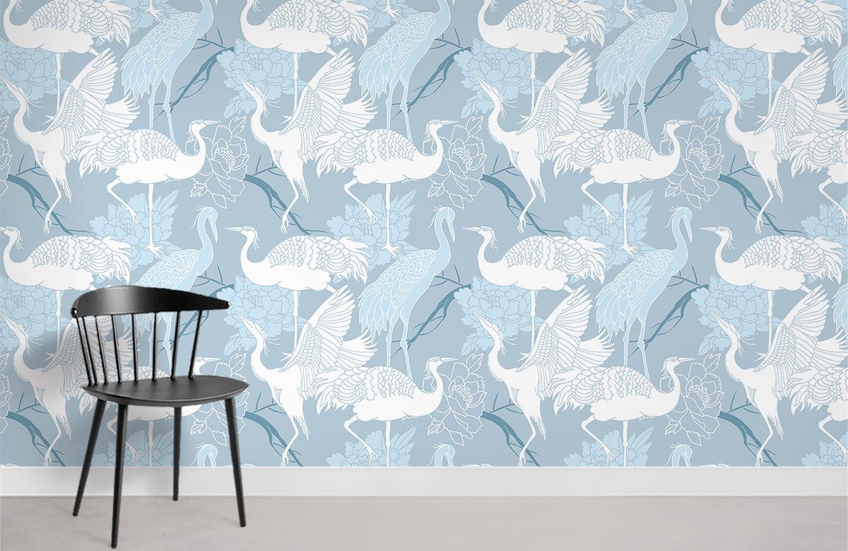 Elegant Blue Crane Pattern Wallpaper with floral designs; black chair, grey flooring in stylish room.