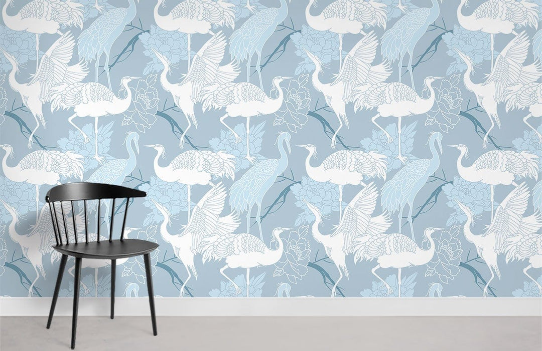 Elegant Blue Crane Pattern Wallpaper with floral designs; black chair, grey flooring in stylish room.