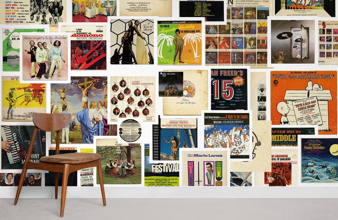 Vintage record album covers collage wallpaper, retro mural with wooden chair, light grey flooring.