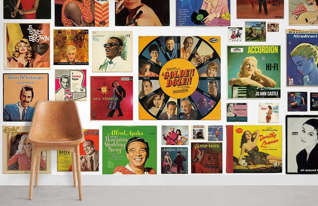 Vintage album cover wallpaper mural with colourful retro music design, brown chair, and light flooring.