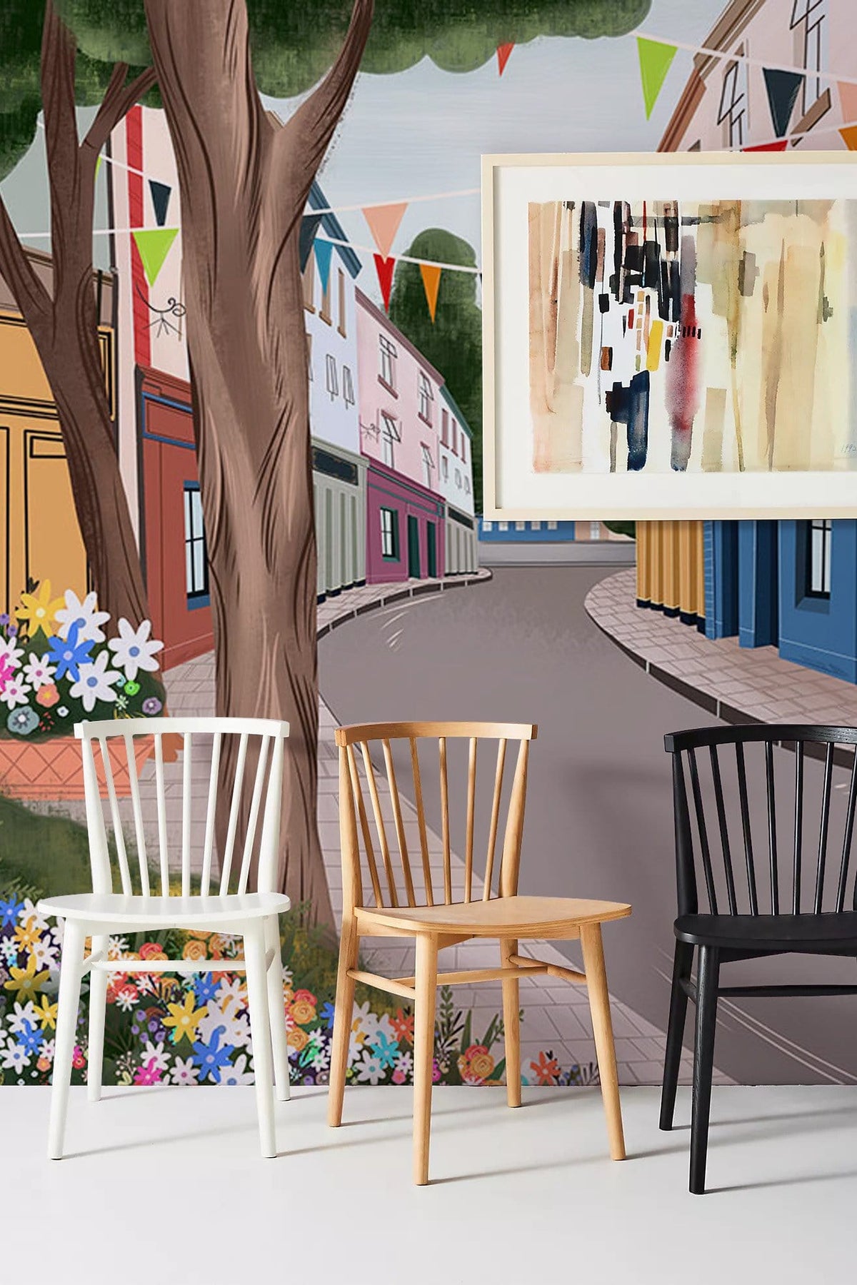 Charming multicolour vintage village street mural wallpaper, cosy interior, white and black chairs, modern decor.