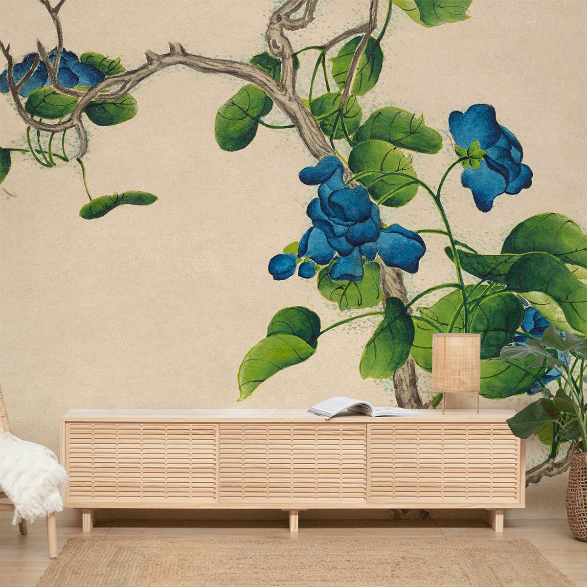 Elegant vintage blue floral mural wallpaper with sideboard, beige rug, and floor lamp in living room.