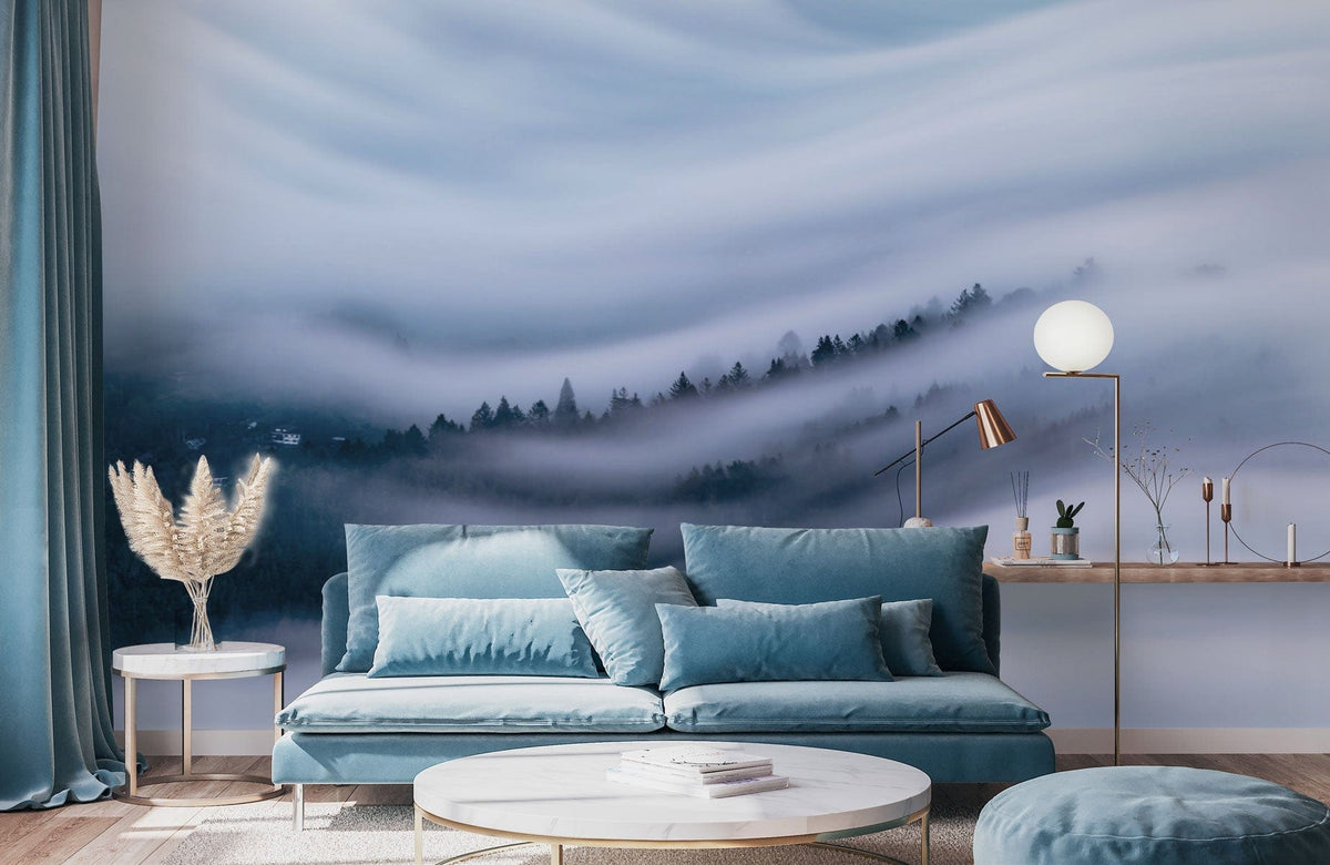 Tranquil Misty Forest Wall Mural, serene blue, modern sofa, round table, stylish living room.