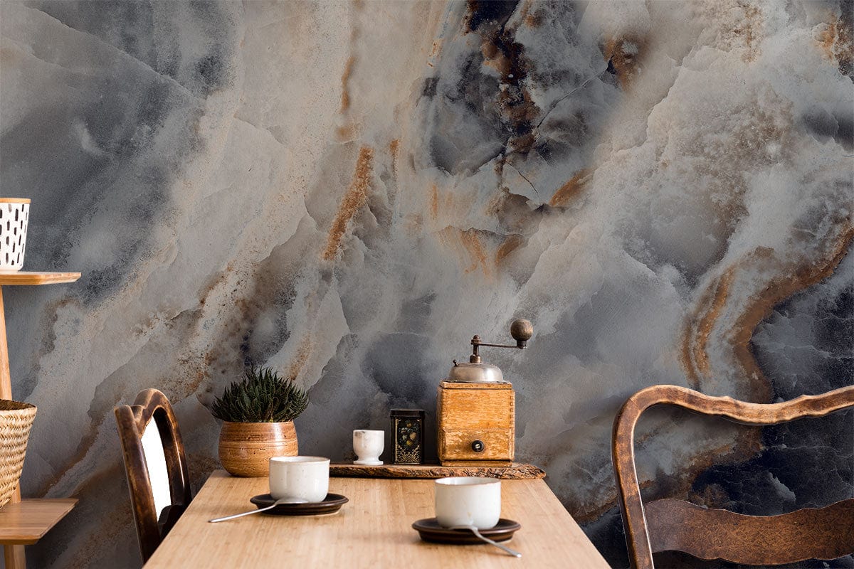 Luxurious marble effect wallpaper with grey, beige swirls; wooden chairs, table in dining room setting.