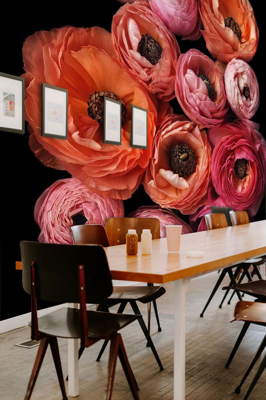 Vibrant Blooms Floral Mural Wallpaper, pink-orange design, dining room, wooden table, framed pictures.
