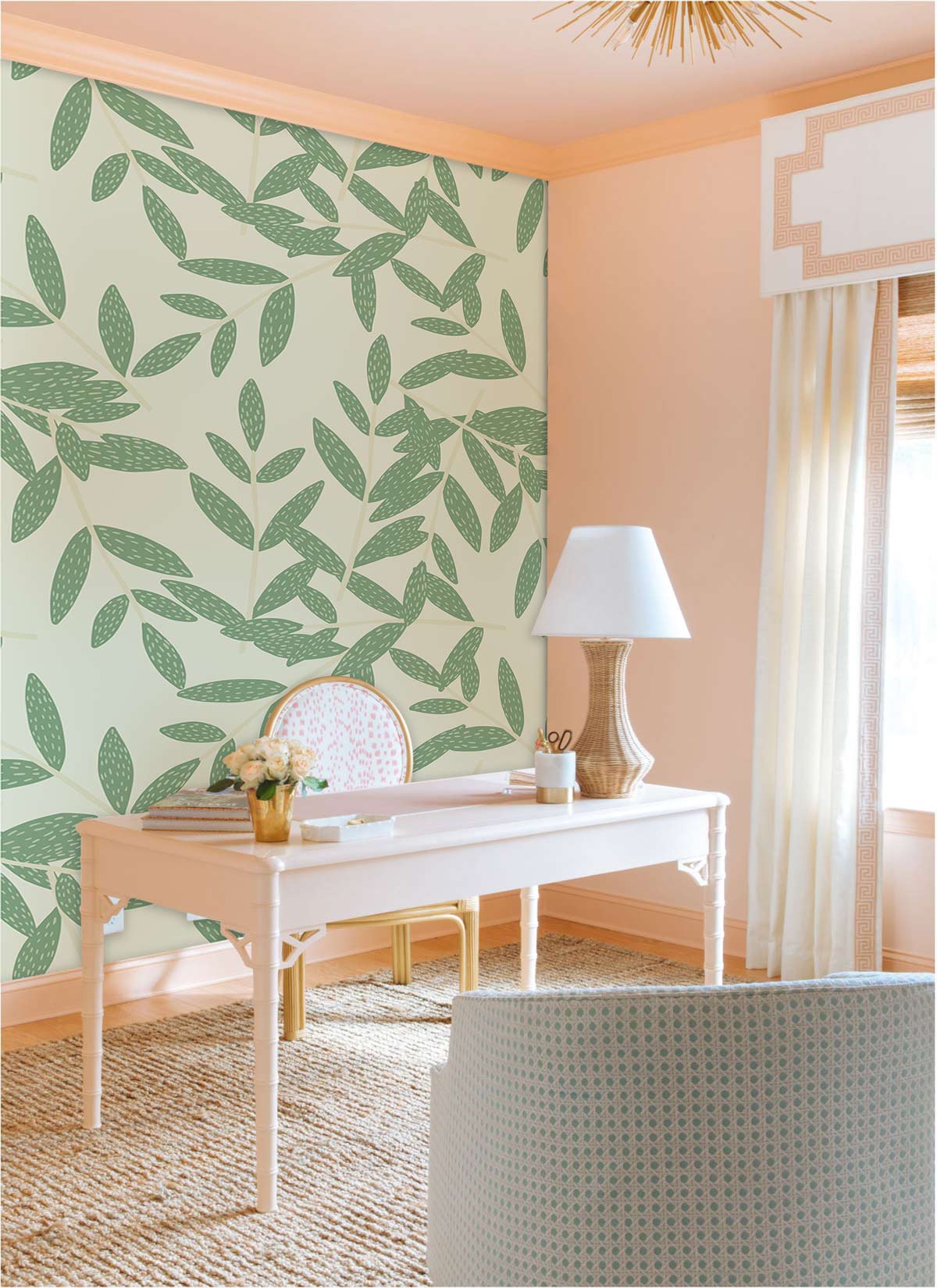 Elegant sage leafy wallpaper in modern study; features elegant desk, woven rug, and sophisticated lamp.