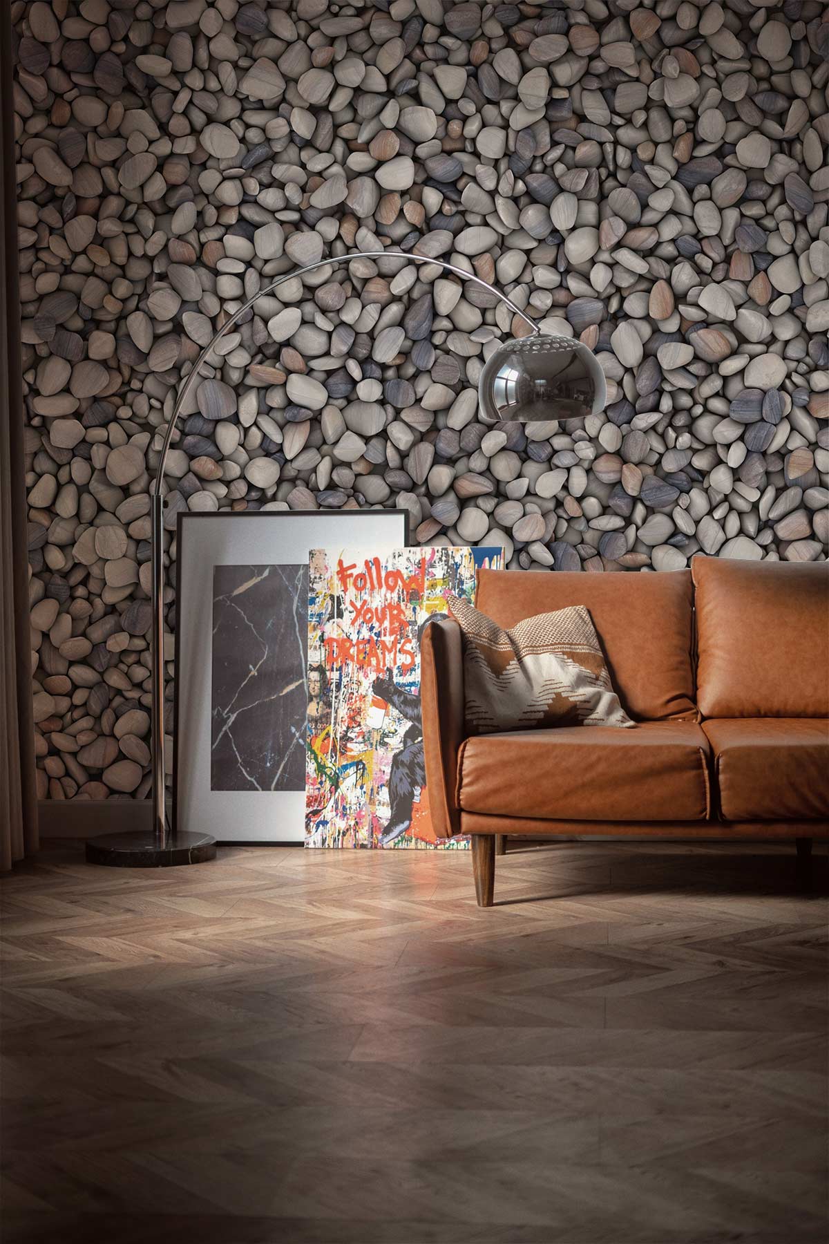 Natural Pebble Stone Textured Wallpaper, earthy grey, brown tones; leather sofa, wooden flooring, arc lamp.