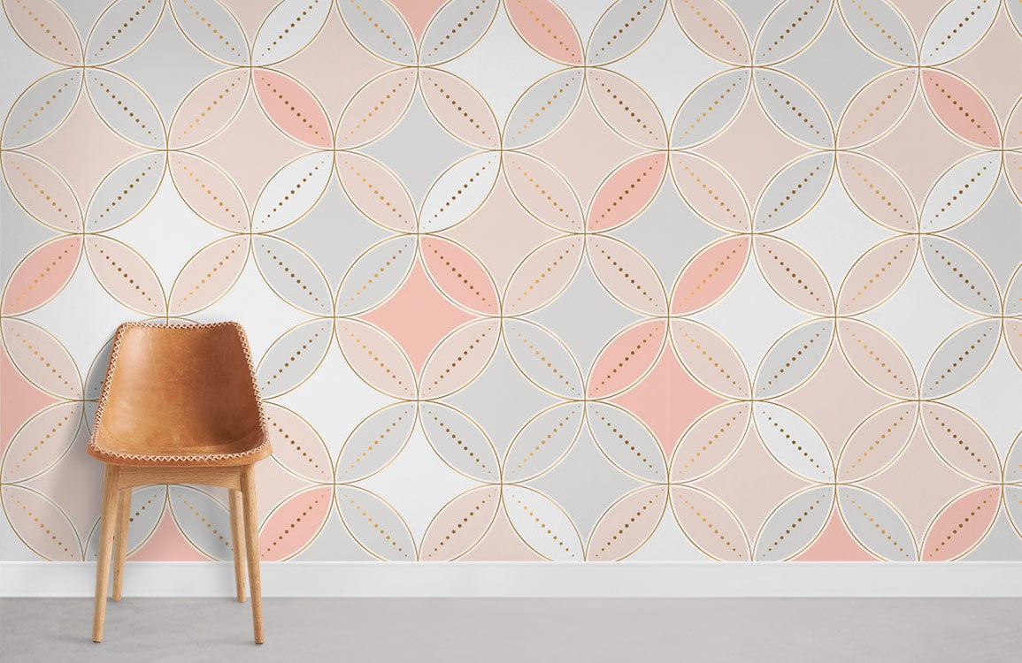 Pastel Geometric Circle Pattern Wallpaper in pink and grey tones, featuring leather chair on grey floor.