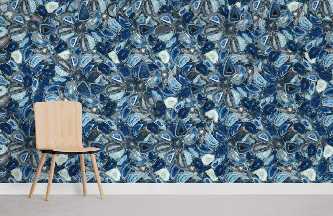 Elegant blue gemstone wallpaper in modern geometric design, featuring light wooden chair on grey flooring.