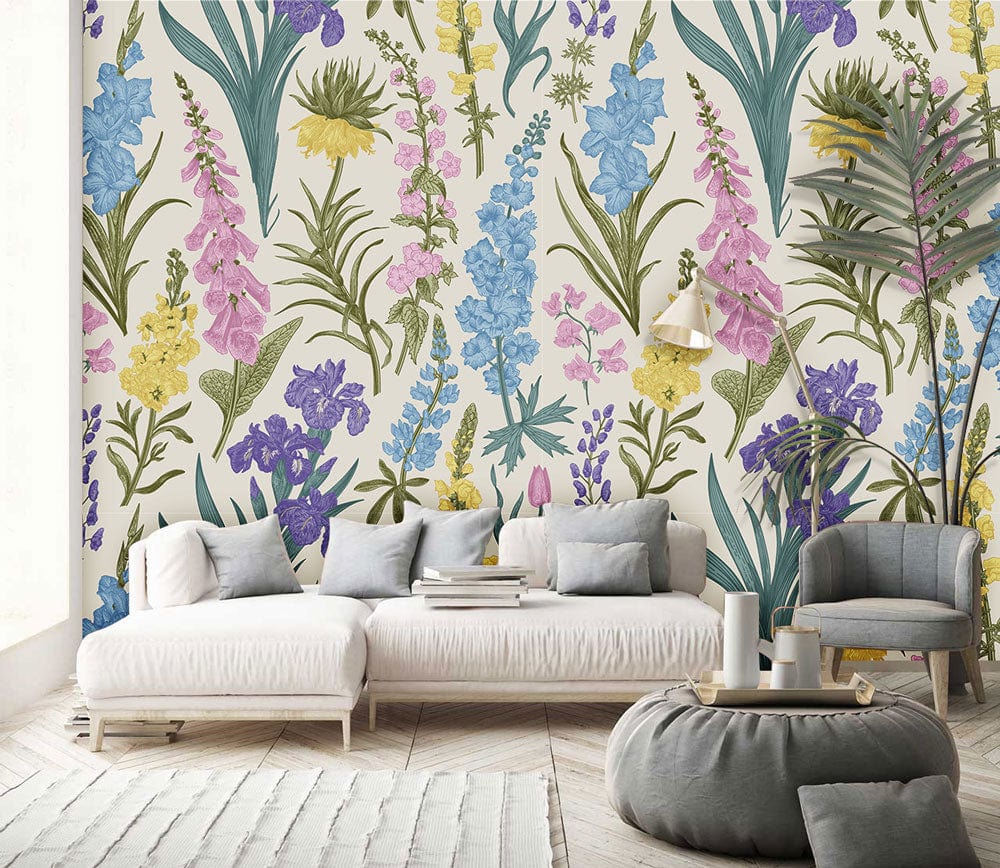Vintage floral meadow wallpaper with pastel botanical design, white sofa, grey chair, chic wood flooring.