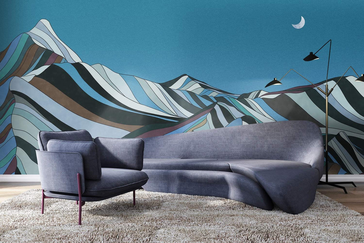 Moonlit Mountain mural, teal tones, grey sofa, modern armchair, wooden flooring, living room setting.