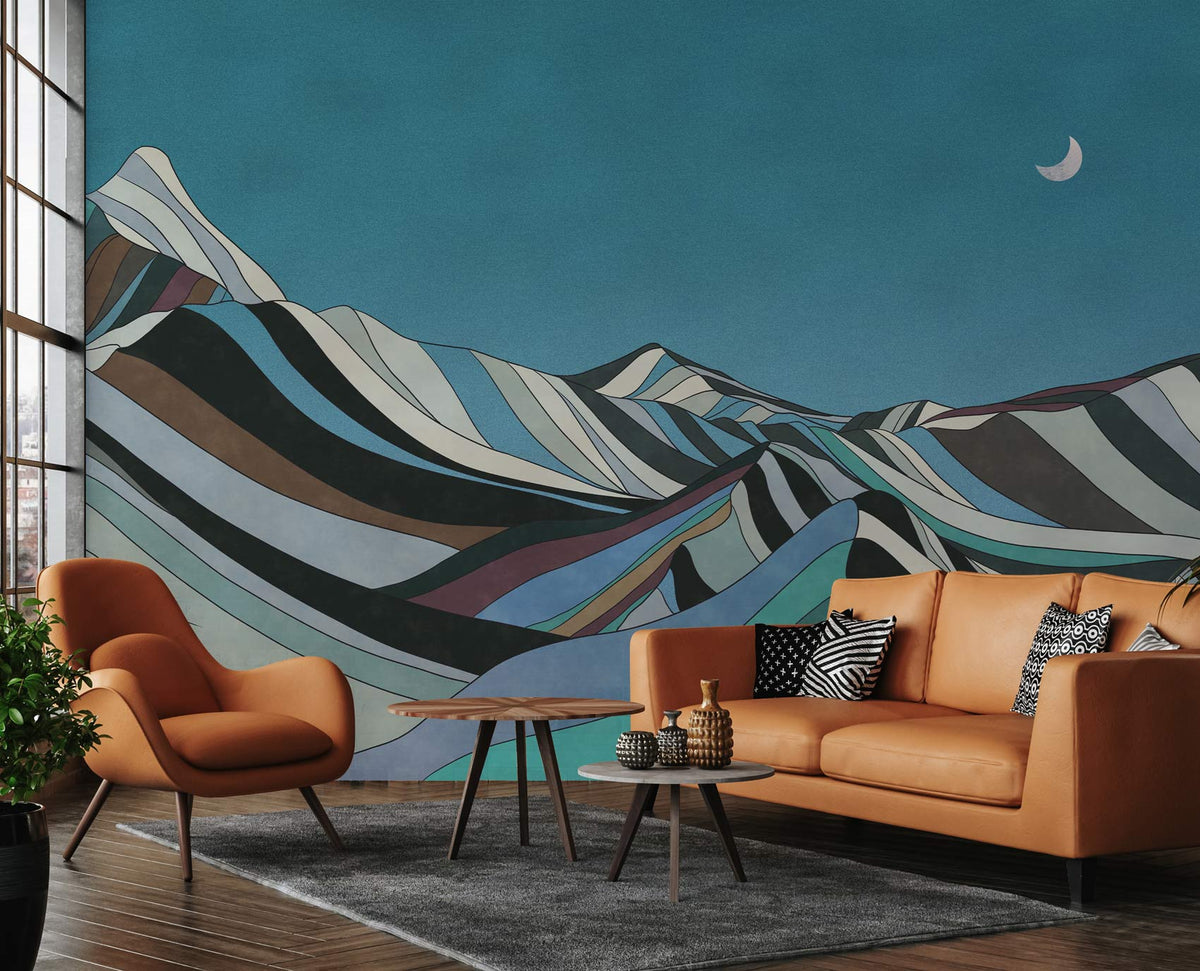 Moonlit Mountain Landscape mural, teal earthy tones, brown leather sofa, wooden flooring, modern living room.