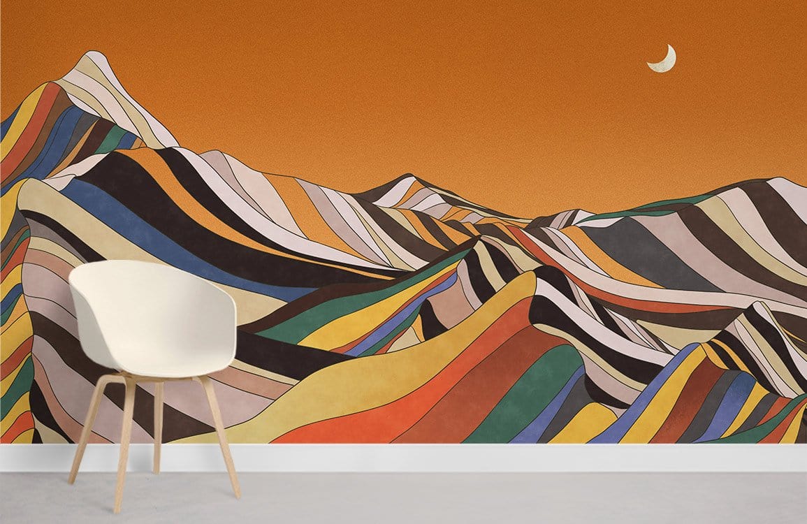 Retro multicolour mountain mural wallpaper, modern chair, orange wall, artistic decor in stylish room.
