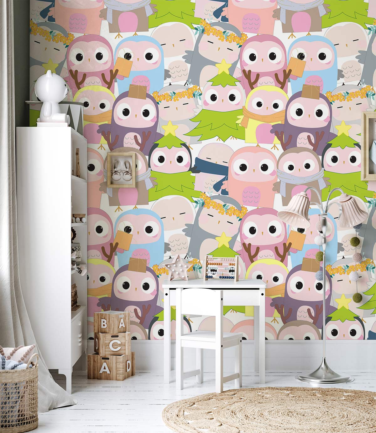 Cute cartoon owls and trees mural wallpaper in children's bedroom with white chair, light wood flooring.
