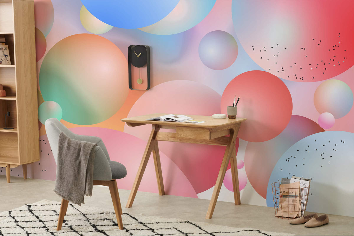 Pastel Bubble Dreamscape mural wallpaper in soft hues, with grey chair, wooden desk, and rug.