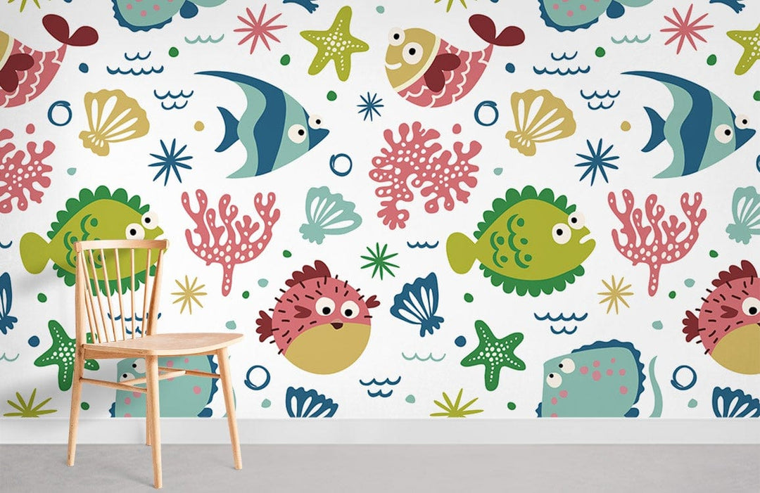 Colourful ocean theme kids' wallpaper with fish, Starfish, and coral, wooden chair, grey flooring.