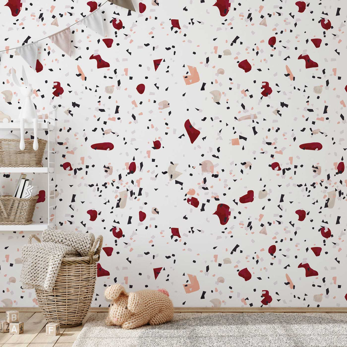 Retro Chic Terrazzo-style wallpaper with baskets and rug in neutral-themed nursery setting.