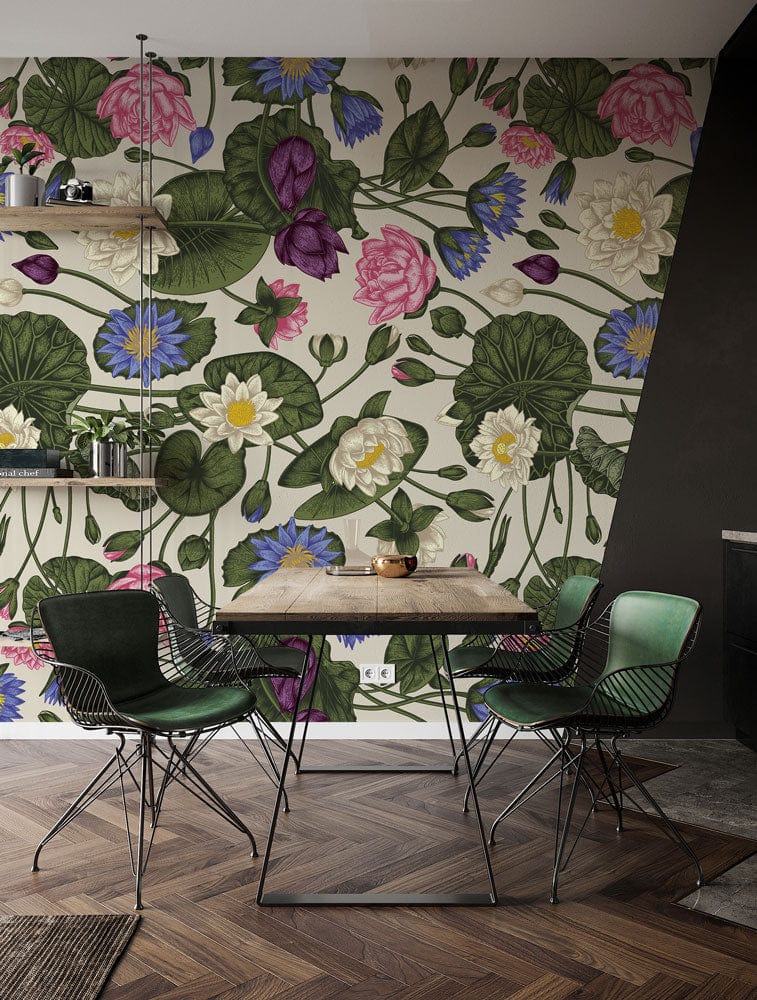 Vibrant vintage floral wallpaper with green, pink, and purple in dining room; green chairs, wood flooring.