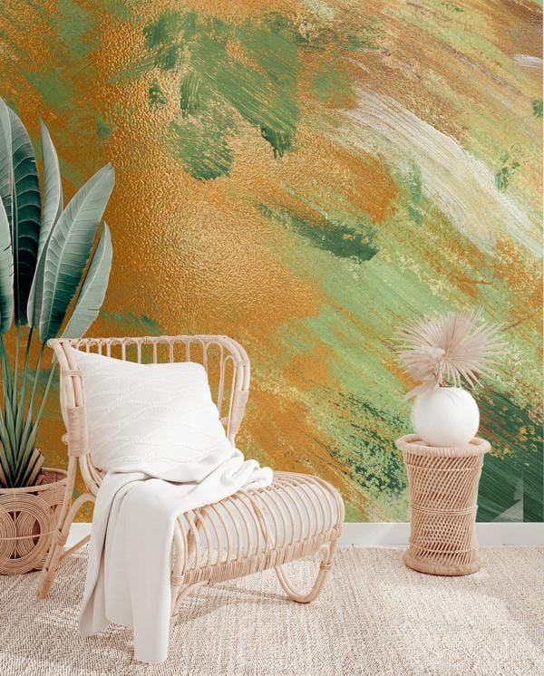 Abstract brushstrokes mural wallpaper with rattan chair, woven rug, and green plant decor in living room.