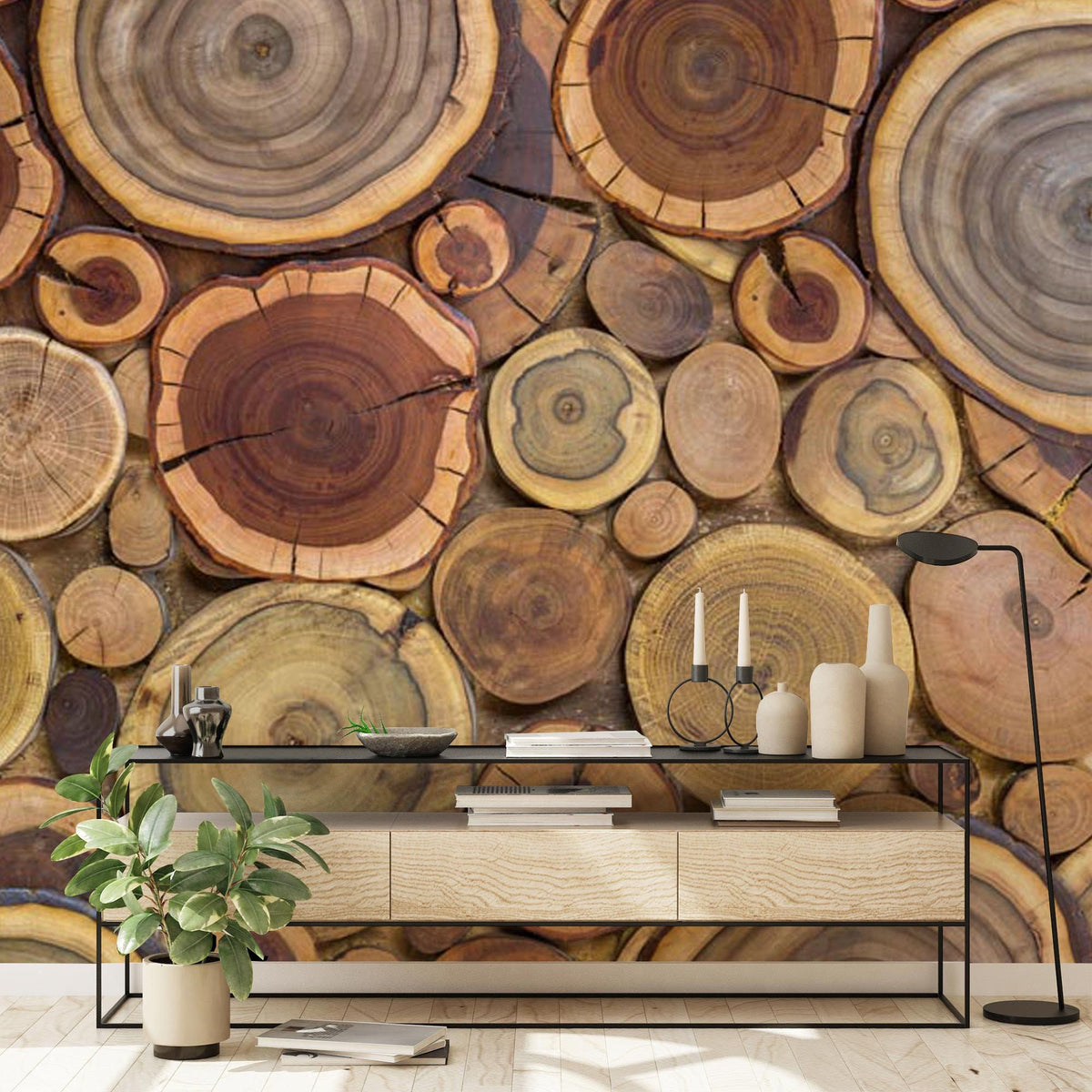 Rustic wood slice wallpaper with earthy tones, modern console table, black floor lamp, plant, neutral flooring.