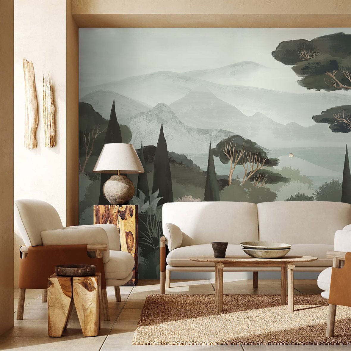 Tranquil Evergreen Landscape Mural in soft hues, cosy beige sofas, rustic wood accents, serene room setting.