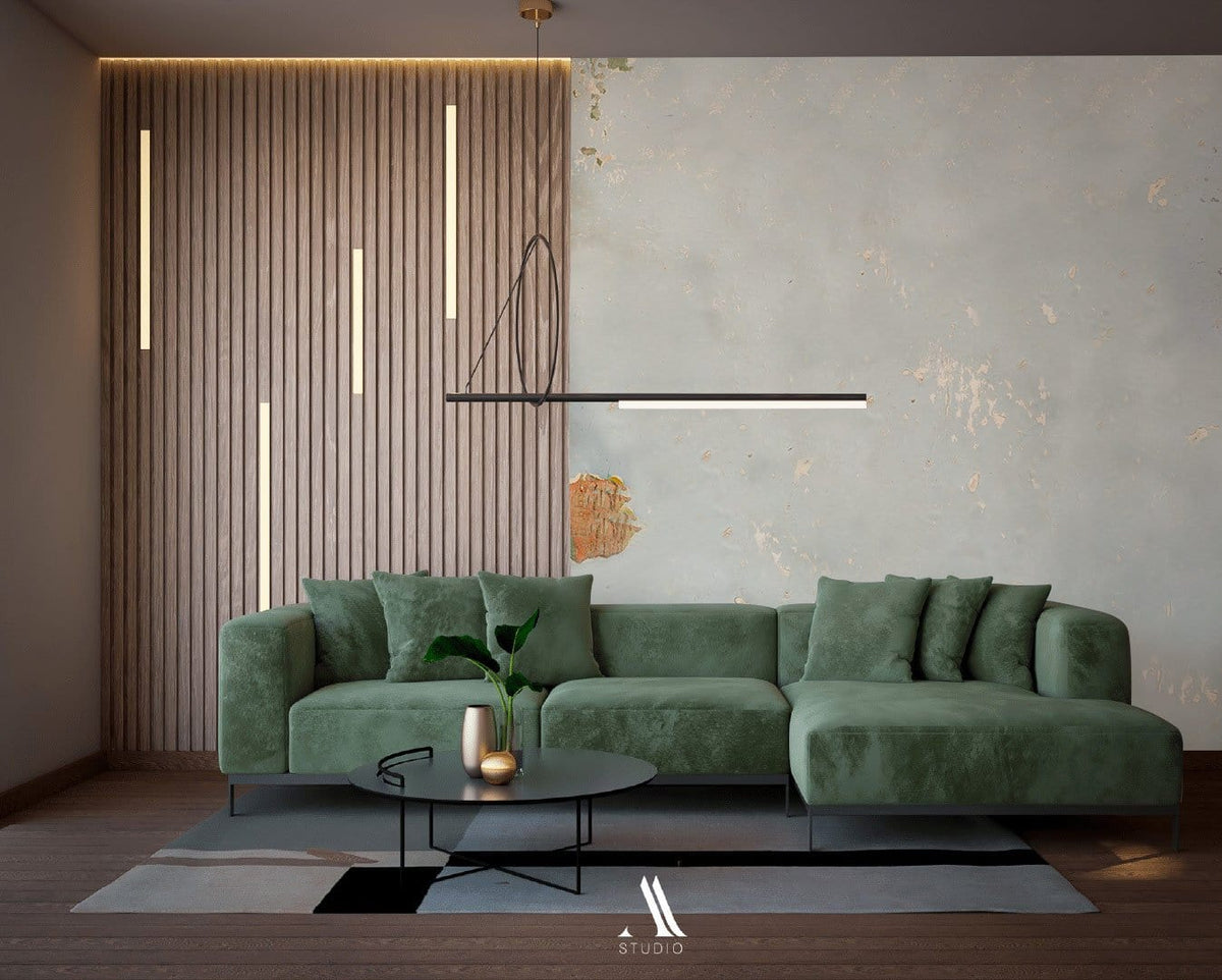 Vintage soft blue distressed mural with green sofa, wood panel wall, modern lighting, and dark flooring.