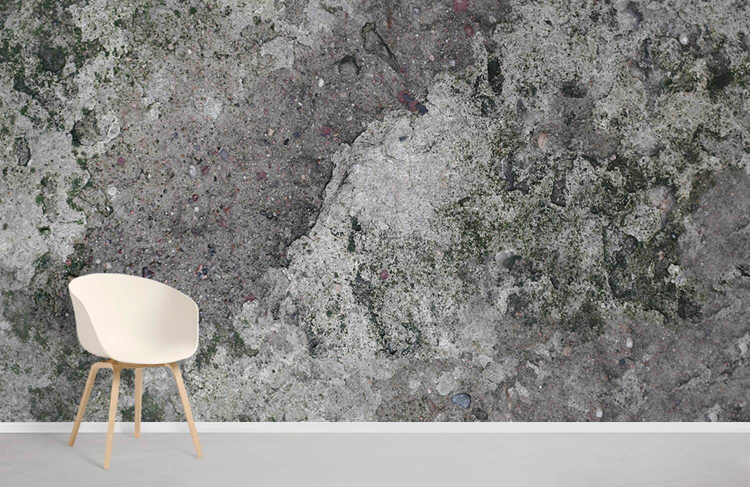 Vintage mossy concrete texture mural wallpaper, earthy grey tones, paired with minimalist white chair, light flooring.