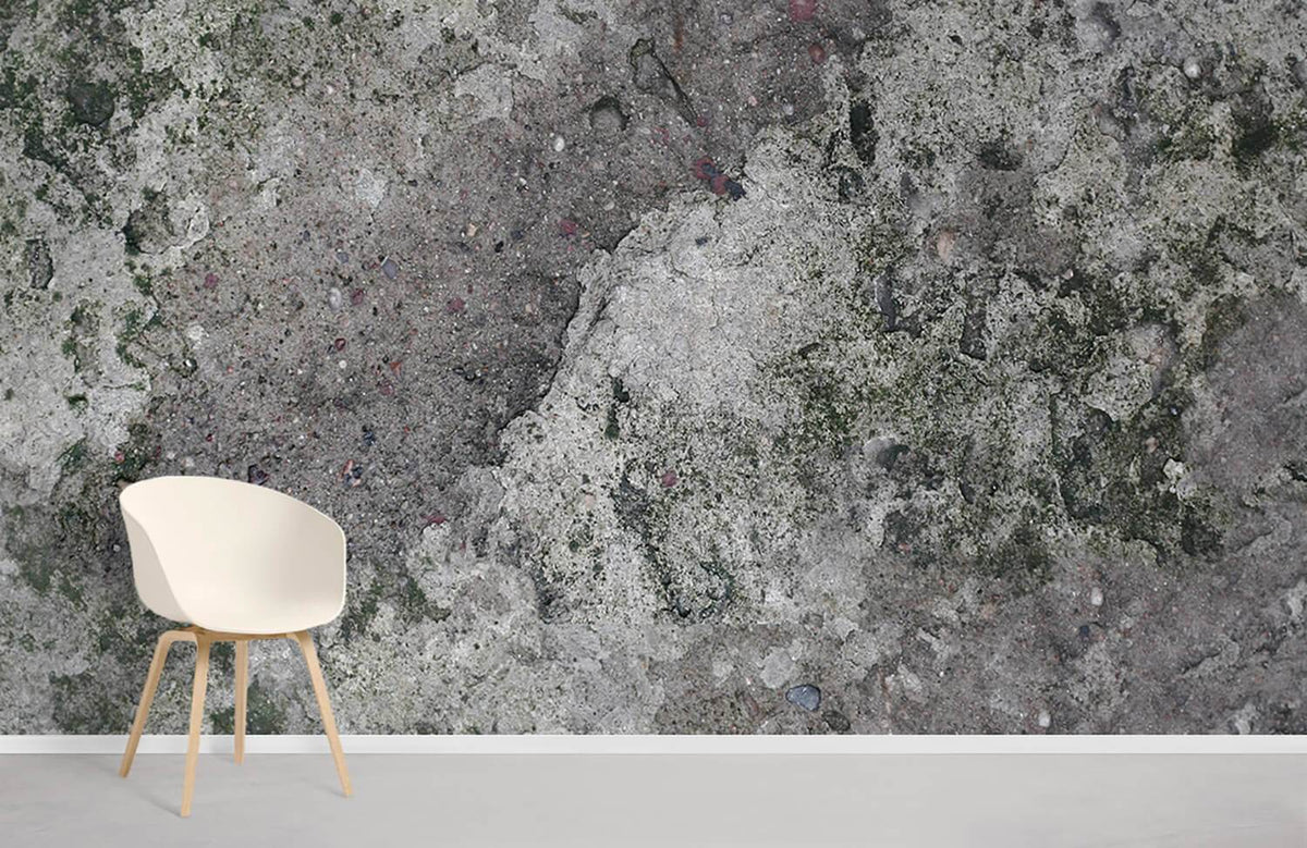 Vintage mossy concrete texture mural wallpaper, earthy grey tones, paired with minimalist white chair, light flooring.