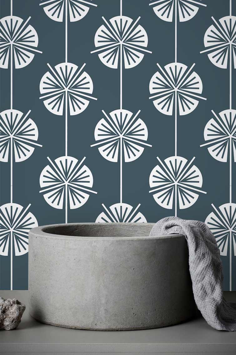 Modern charcoal botanical floral wallpaper with stylish grey tones; concrete basin complements. Elegant room decor.