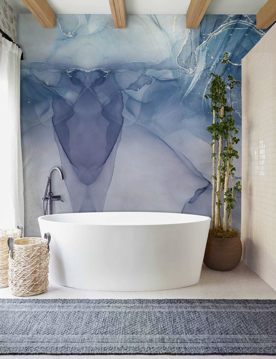 Elegant Blue Watercolour Abstract Mural Wallpaper, marble design; white bathtub, grey rug, modern bathroom.