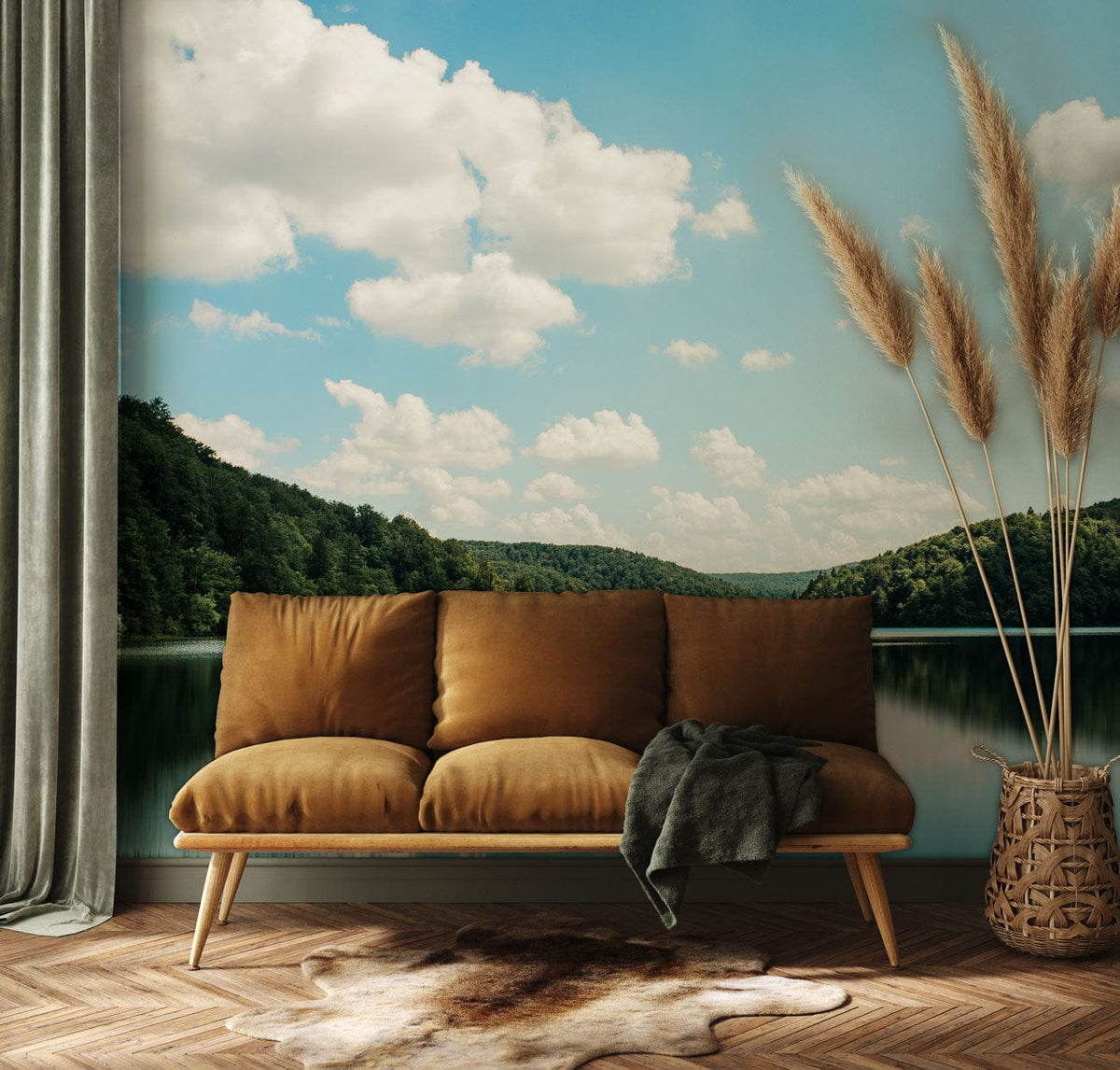 Tranquil mural wallpaper, brown suede sofa, wooden flooring, green curtain in contemporary living room setting.
