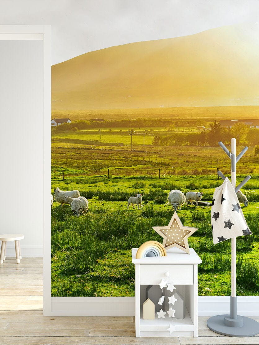 Tranquil Green Countryside Wallpaper with pastoral scene, light wooden flooring, coat rack, white furniture.