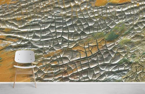 Golden Earthy Abstract Textured Wallpaper with metallic crackle design, white modern chair, wooden flooring.