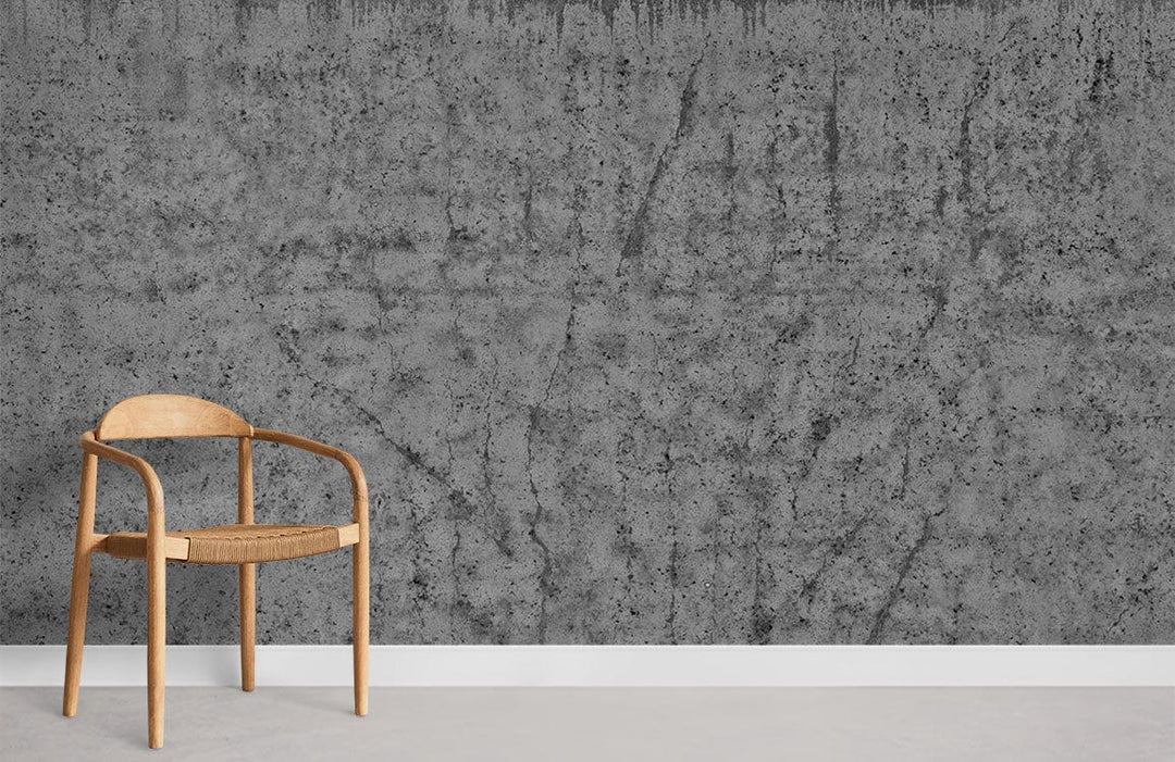 Industrial grey textured concrete effect wallpaper with modern chair, enhancing urban style decor room.