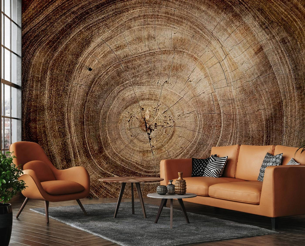 Brown woodgrain wallpaper with rustic tree rings, orange sofas, grey rug, wooden flooring, modern living room.