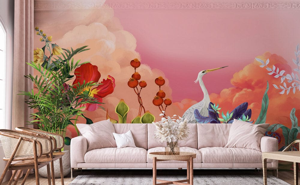 Exquisite Floral Paradise Mural Wallpaper featuring heron; pink sofa; wooden chairs; pastel living room decor.