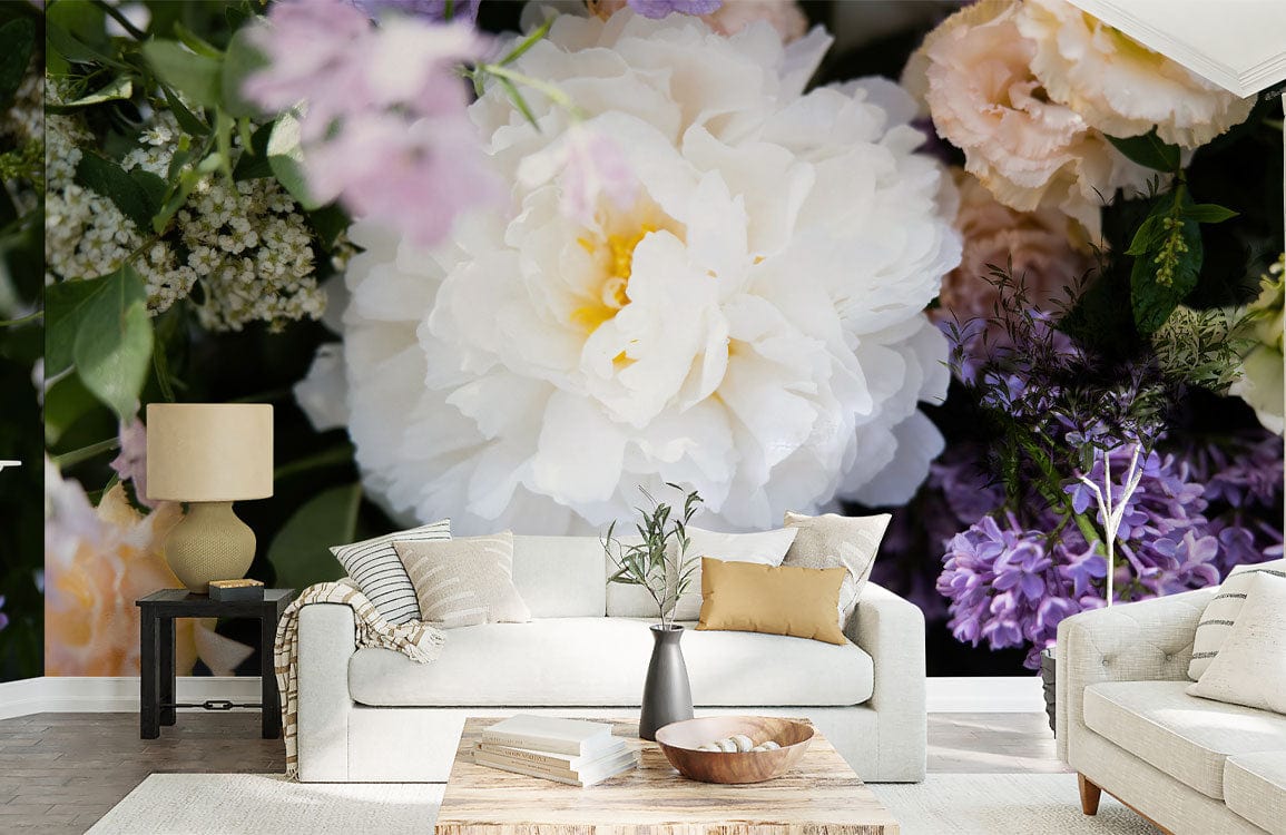 Elegant living room featuring elegant floral blossom wallpaper; white sofa, wooden coffee table, and contemporary decor.