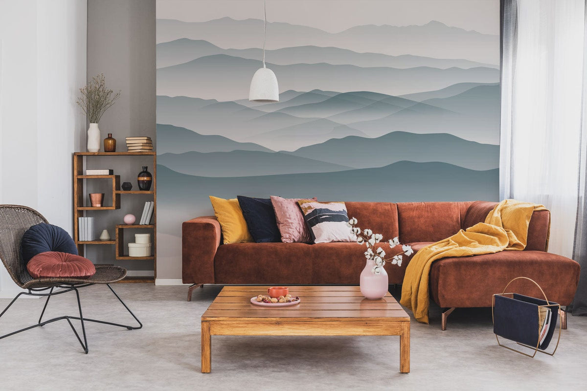 Serene Misty Mountains mural wallpaper with brown sofa, modern pendant light, wooden table, grey floor.