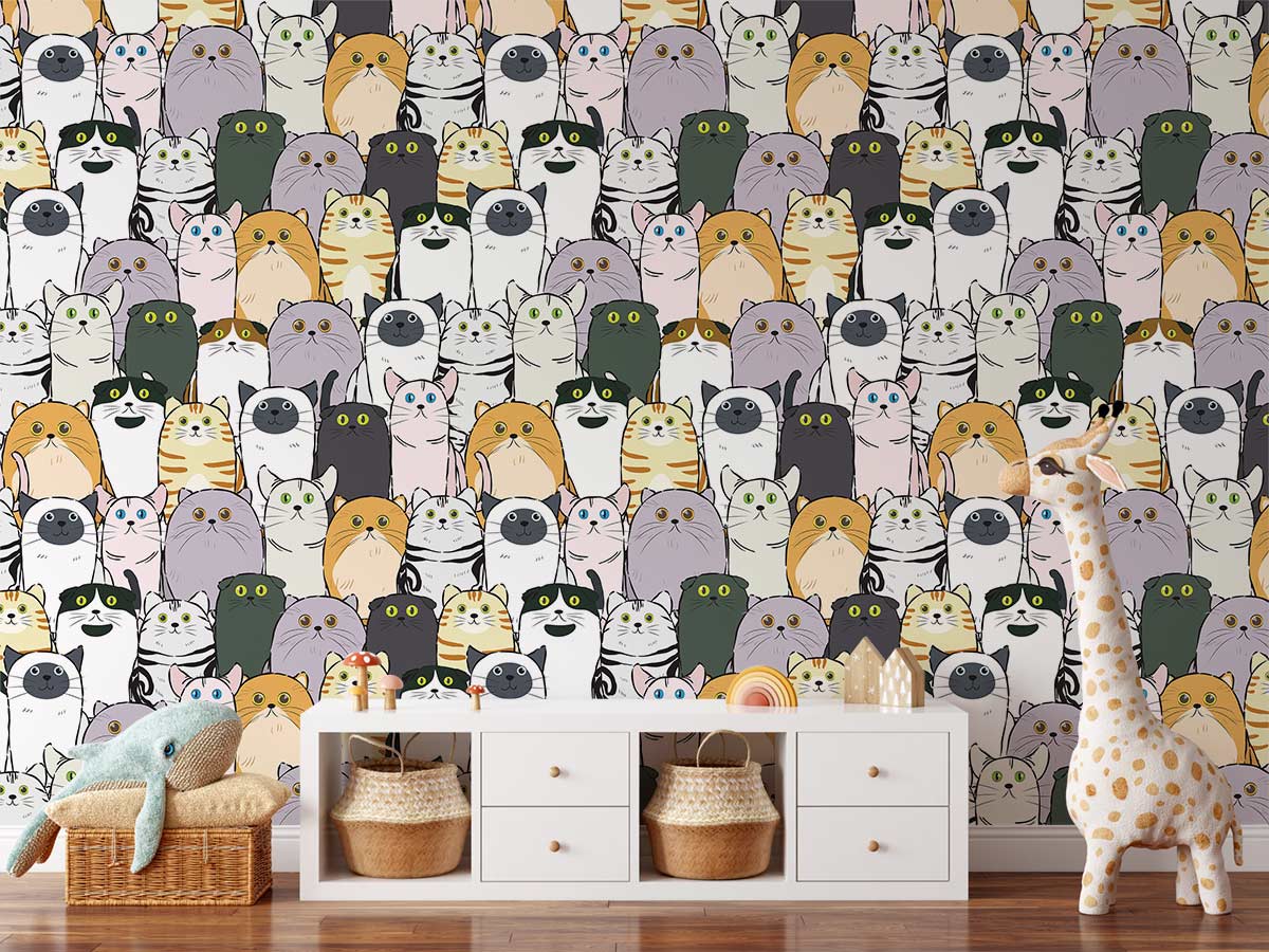 Adorable cartoon cat wallpaper in multicolour, playful design; white chest, wooden floor, nursery room.