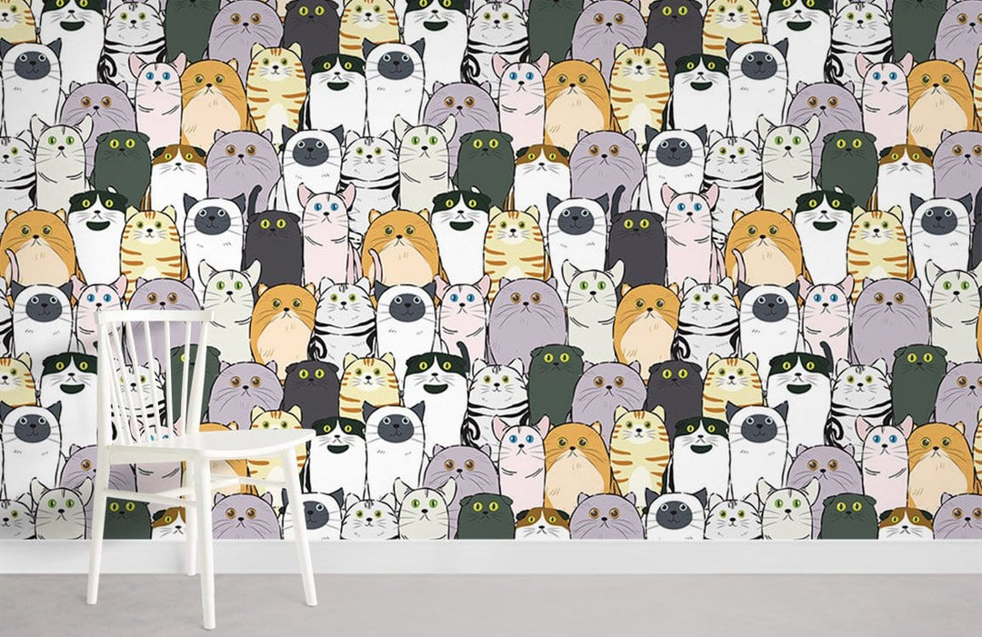 Multicolour cartoon cat wallpaper, playful design, white chair, whimsical home decor, grey flooring.