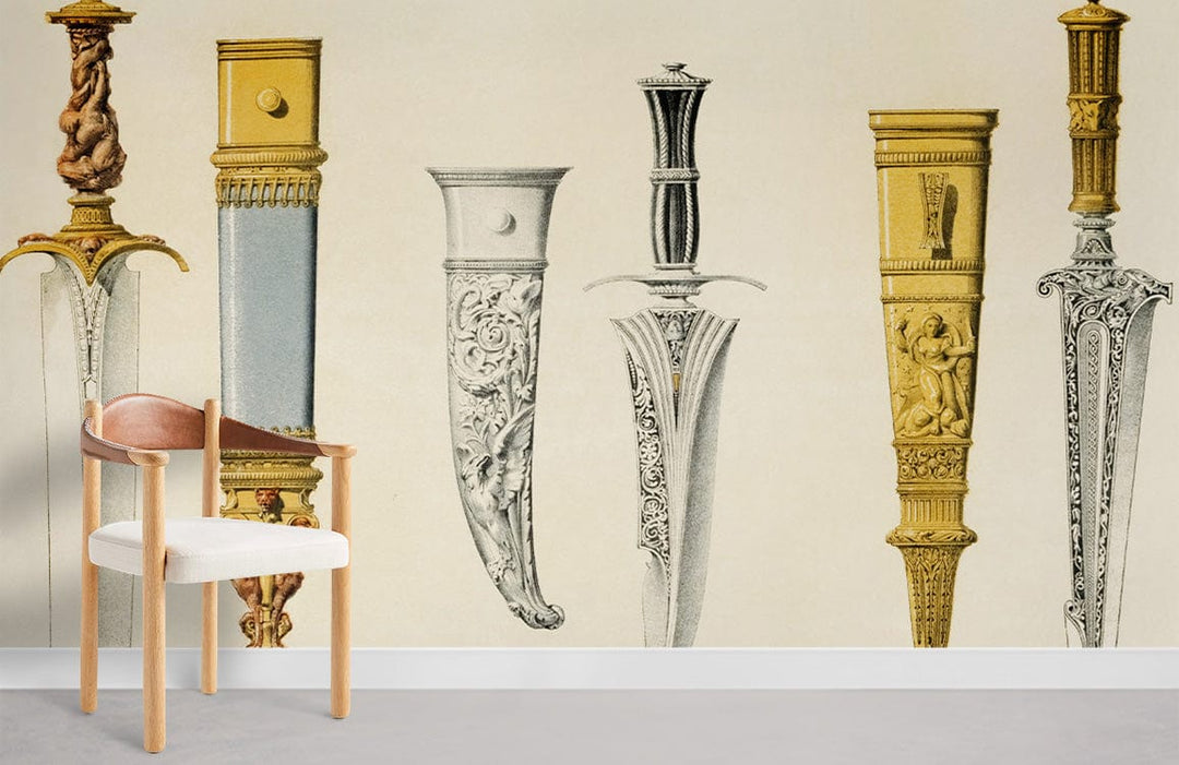 Antique Dagger Art Deco Mural Wallpaper, vintage gold, and silver design; beige wall, modern chair.