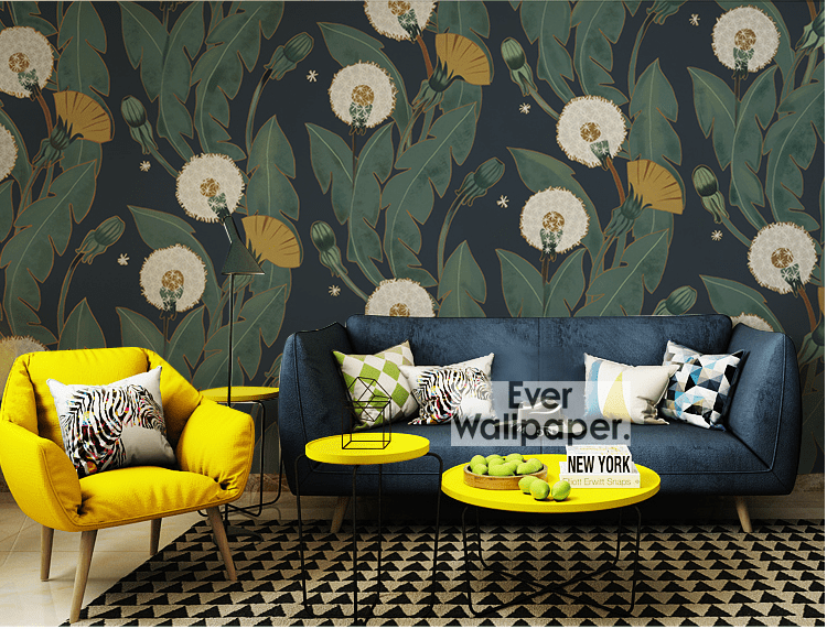 Ever Wallpaper Vintage Botanical Dandelion Dark Green Floral Mural with blue sofa, yellow armchairs, geometric rug.