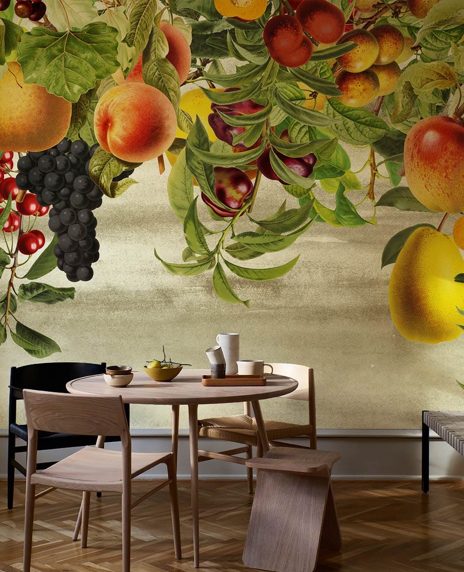 Vintage Orchard Fruit Mural Wallpaper enhances dining room with wooden furniture and parquet flooring.