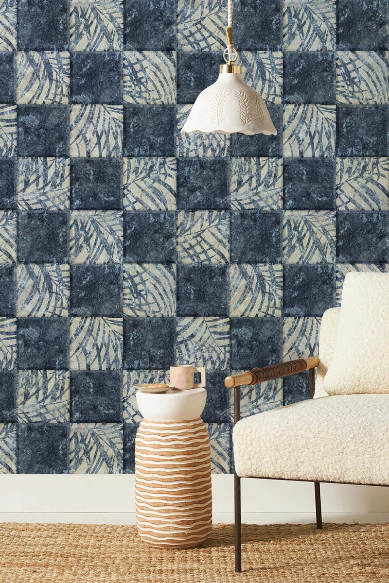 Blue and White Geometric Leaf Pattern Wallpaper, modern interiors, beige armchair, woven rug, pendant light.