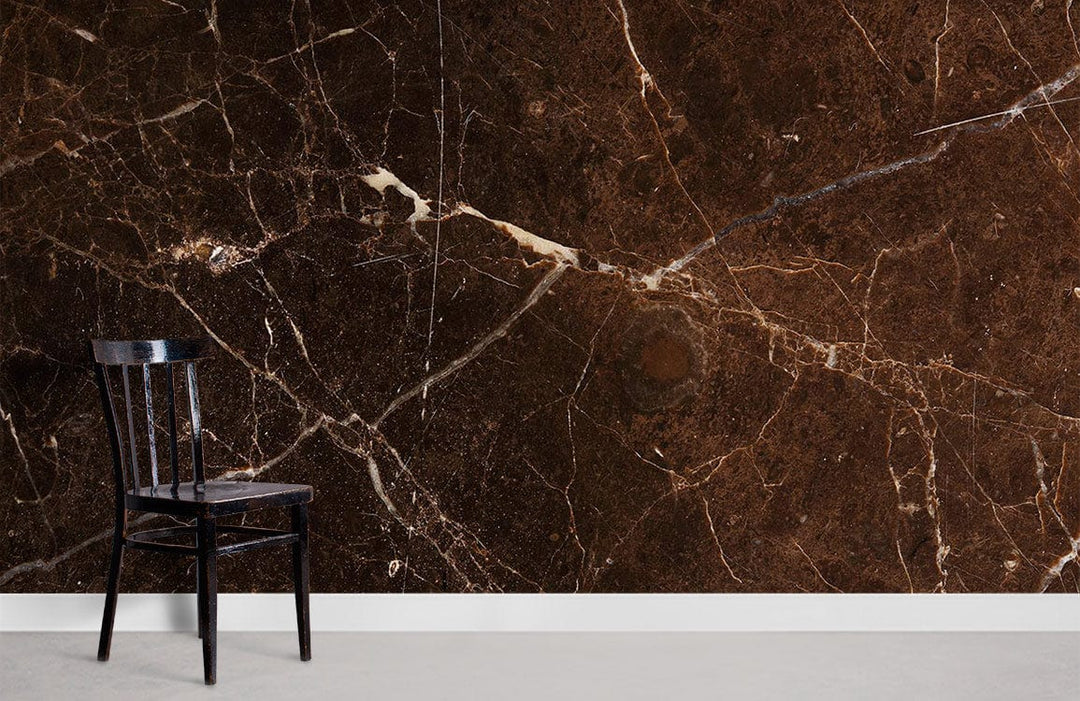 Luxe Brown Marble Effect Wallpaper with chair; concrete floor; sophisticated veined design adds elegance.